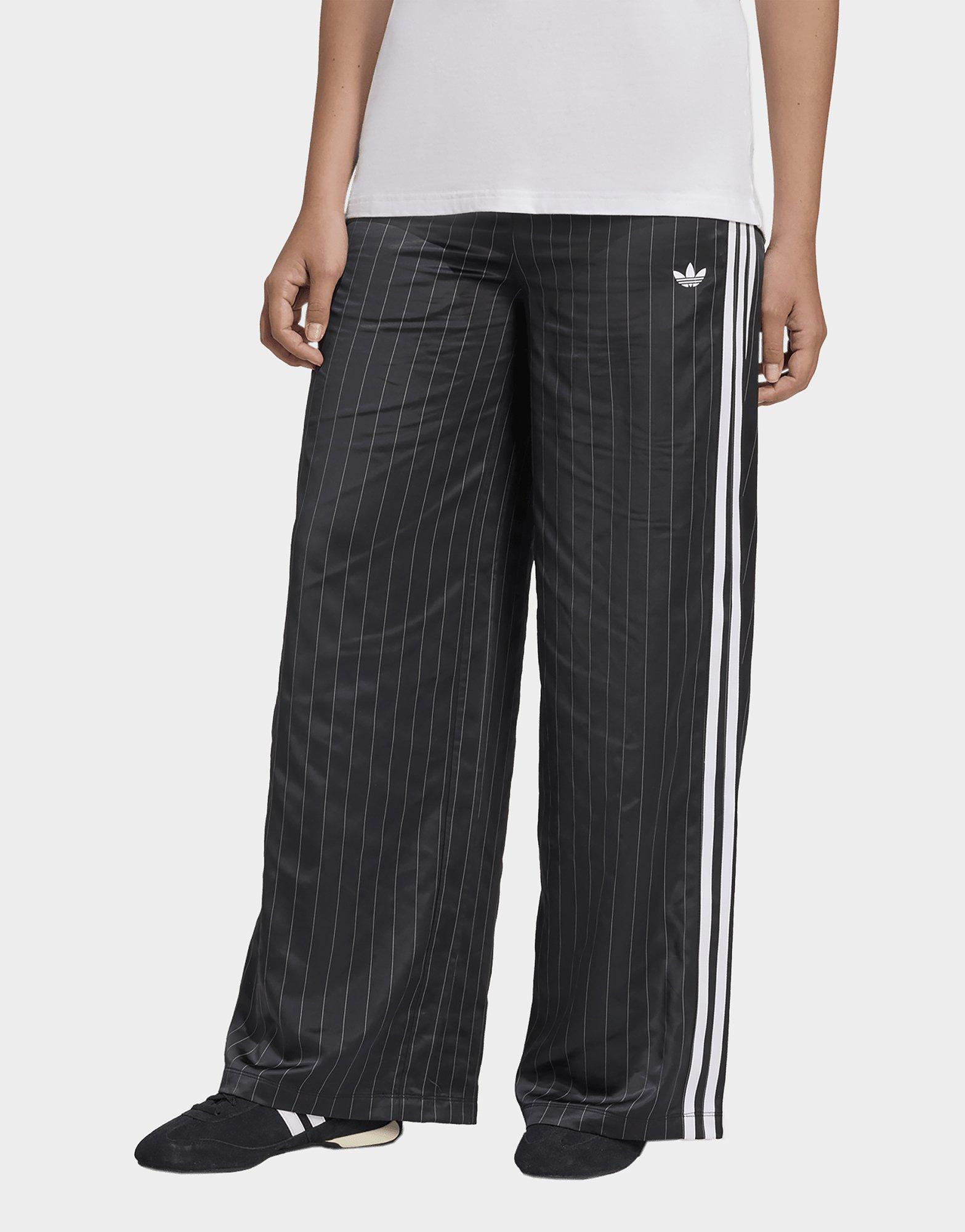 מכנסיים ארוכים מתרחבים Stripes | נשים