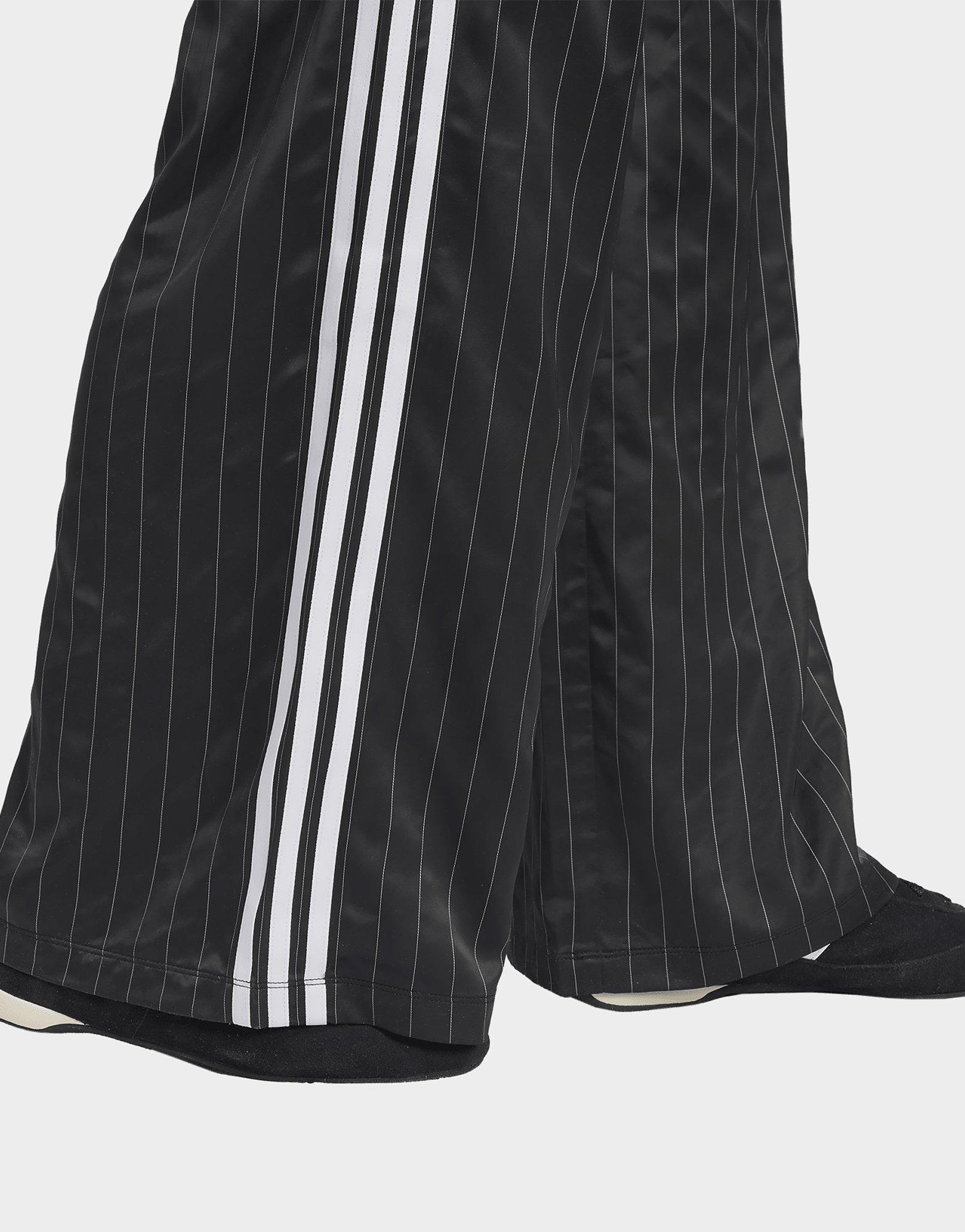 מכנסיים ארוכים מתרחבים Stripes | נשים