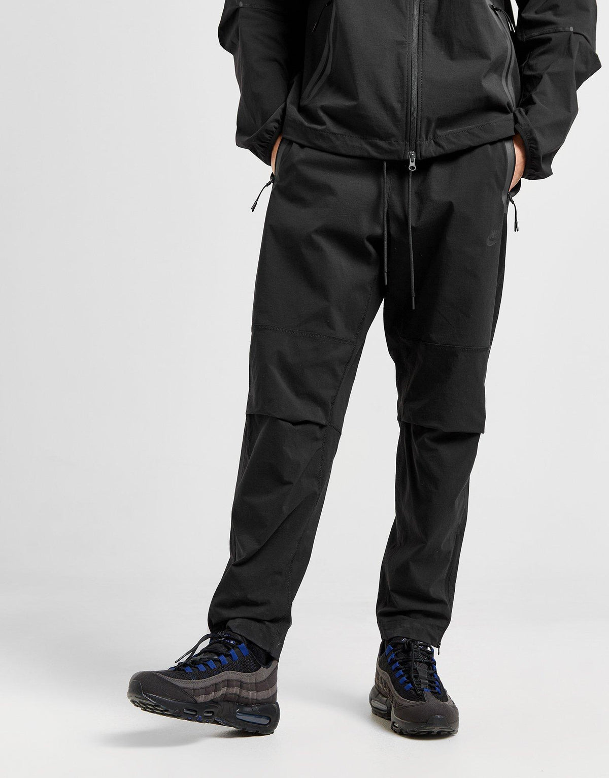 מכנסי טראק Nike Tech Woven | גברים