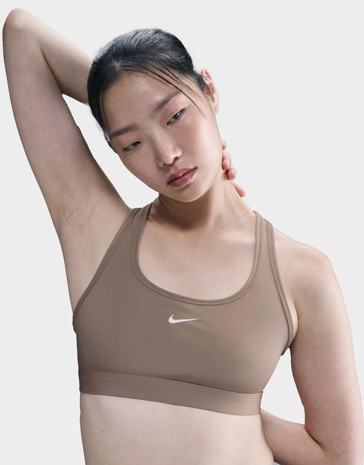טופ ספורט דריי פיט Swoosh | נשים